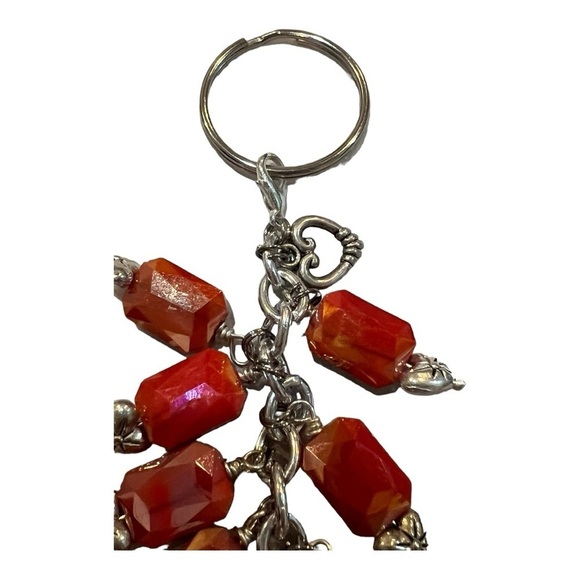 Hand made silver-tone keychain. Iridescent orange/red tone with heart. - Picture 5 of 6
